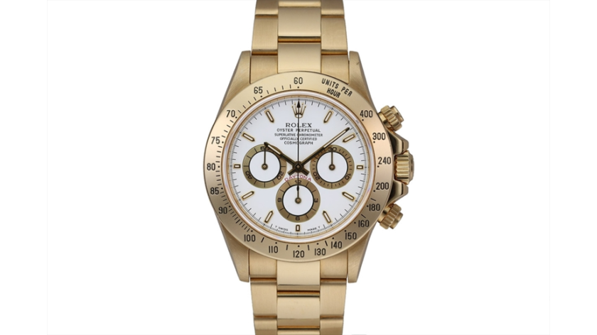 genuine gold Rolex watch with white background