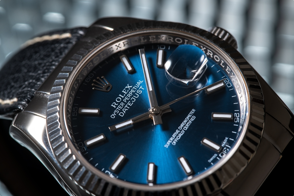 rea; Rolex watch with blue watch face